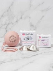 Contents of the Silverette Starter Set: nursing cups, cup holder and cleaning kit