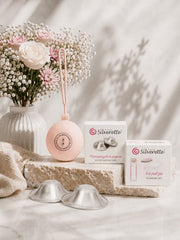 Silverette Starter Set: silver nursing cups, pink silicone cup holder and cleaning kit
