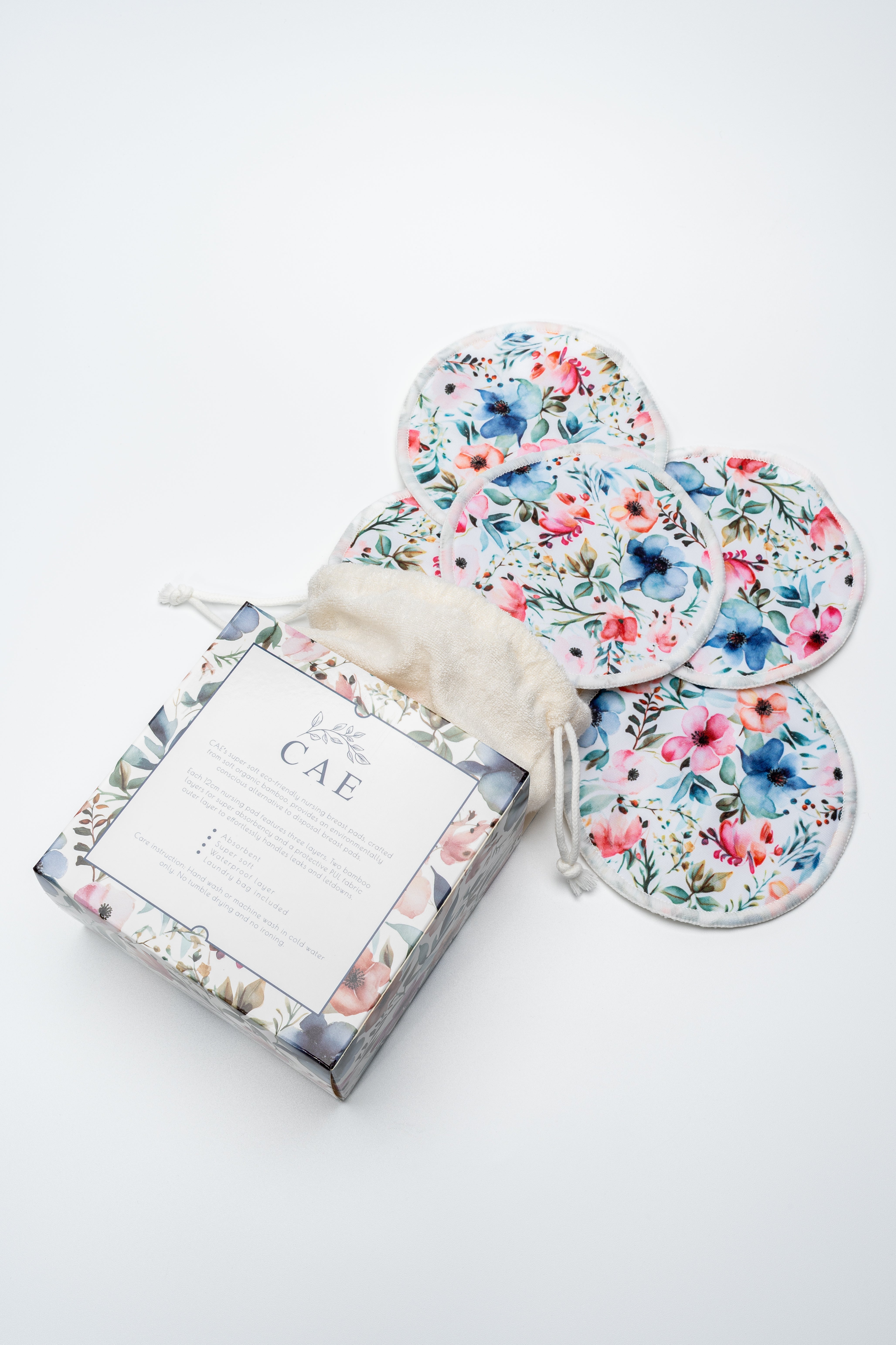 Soft reusable bamboo nursing pads with floral print outer layer